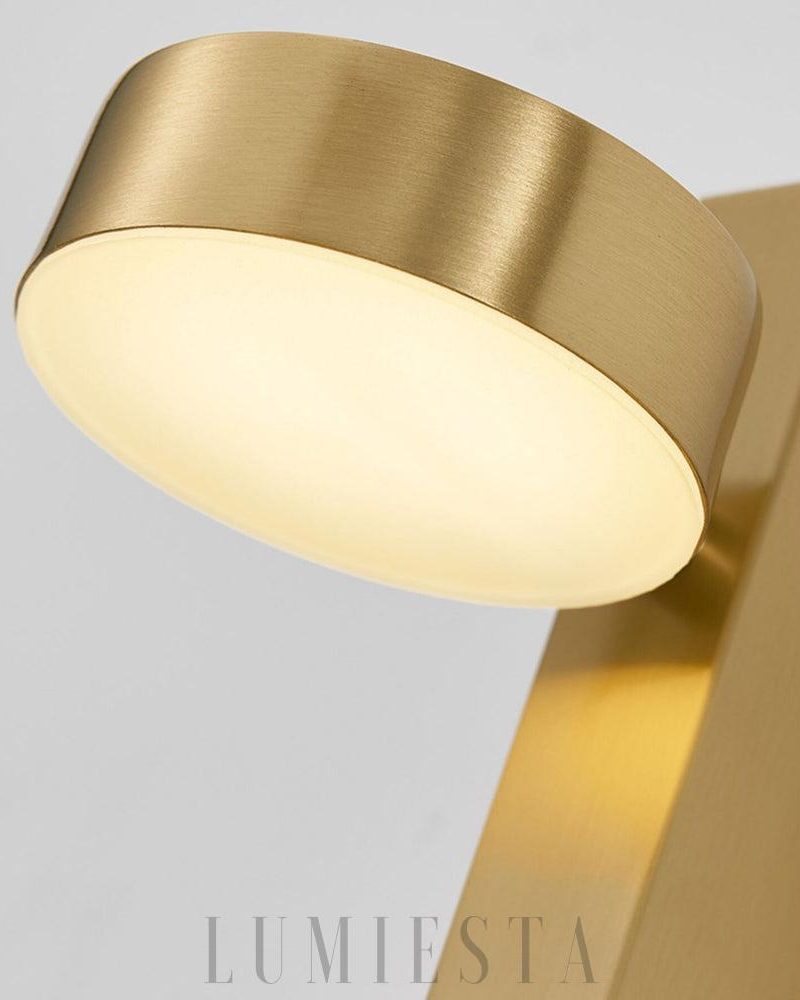 Nowoczesna lampa ścienna z regulowanym światłem w kolorze złotym