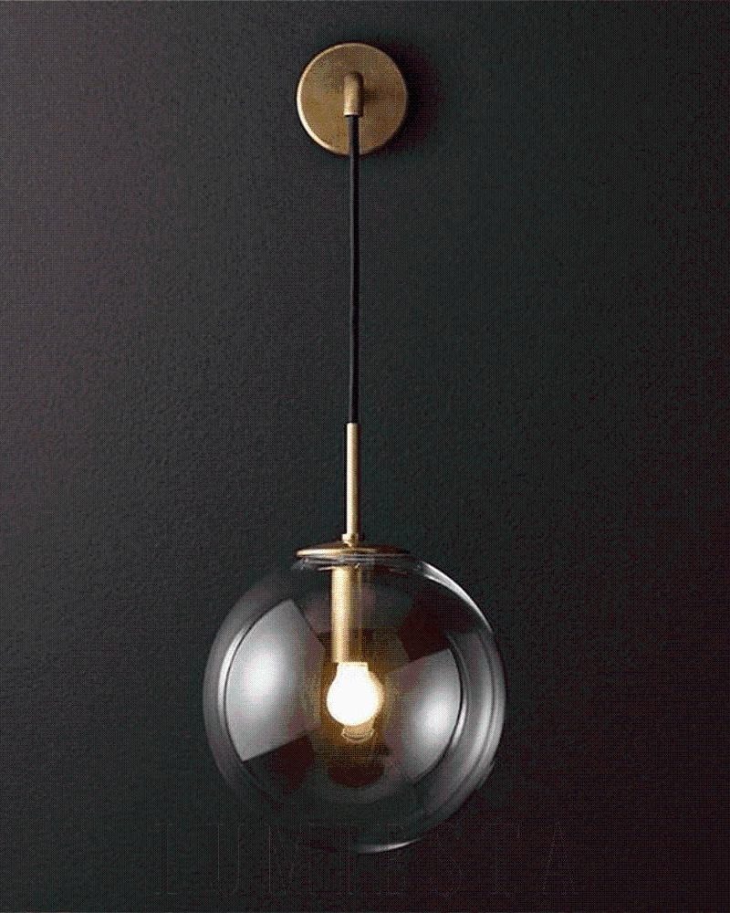 Elegancka wisząca lampa kula ze szkła i metalu