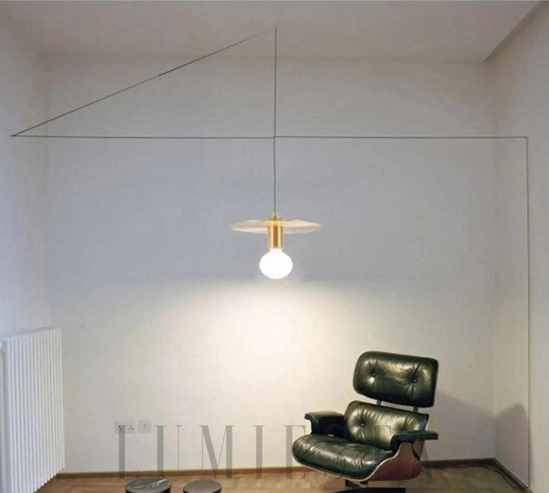 Nowoczesna lampa wisząca złota minimalistyczna styl loftowy