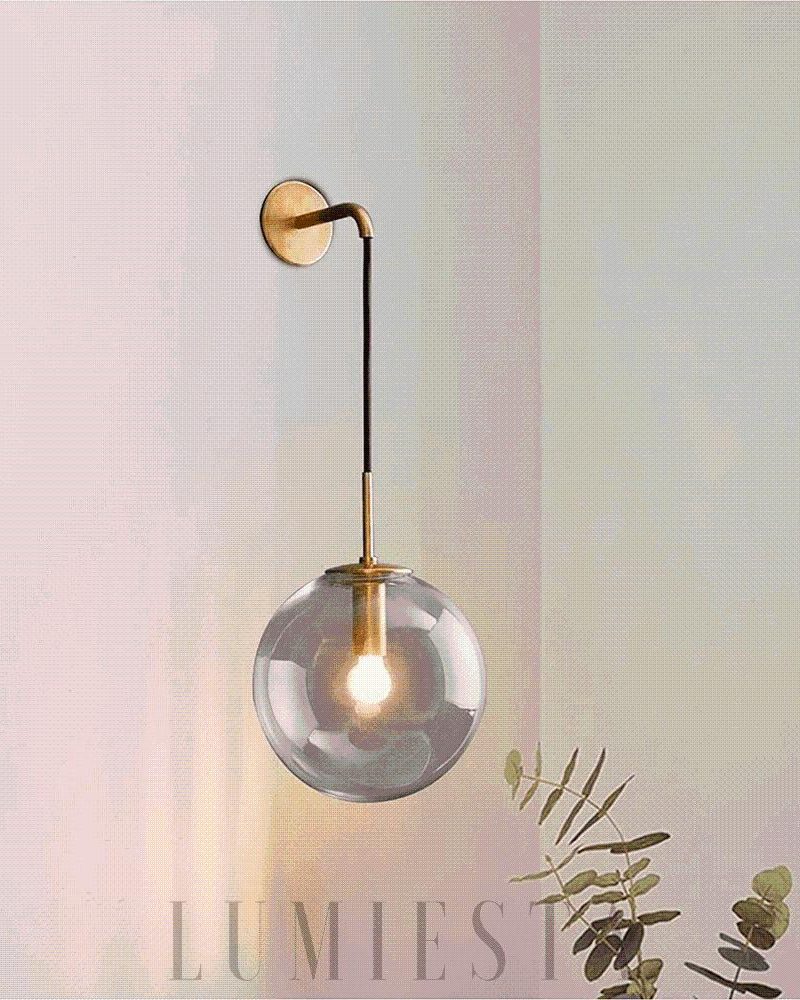 Elegancka wisząca lampa kula ze szkła i metalu