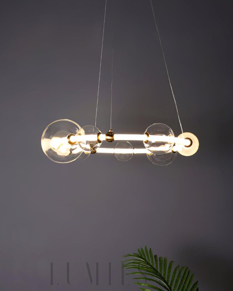 Lampa wisząca Puppet w złotym kolorze z przezroczystymi kloszami