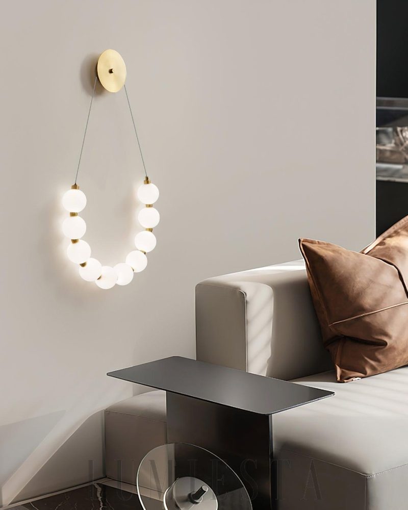 Lampa ścienna Necklace Loop w stylu nowoczesnym z mosiądzu