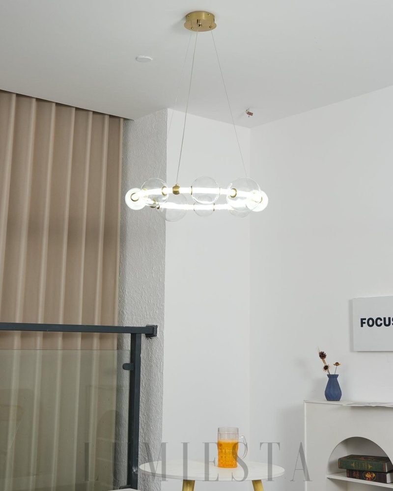 Lampa wisząca Puppet w złotym kolorze z przezroczystymi kloszami