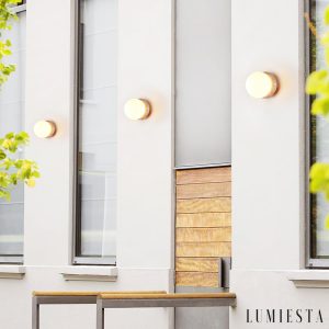 Astereta - kinkiet trawertynowy do salonu, pełny widok na ścianie