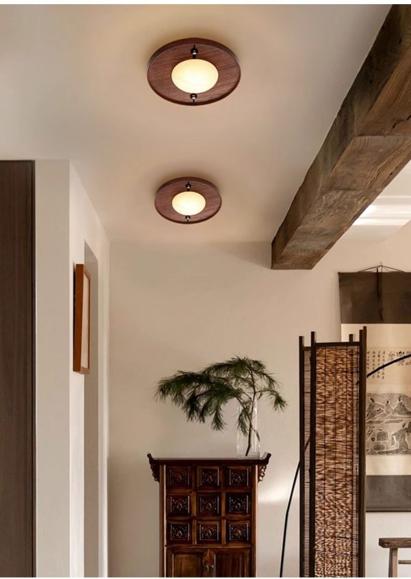 Lampa ścienna Alabaster Odis okrągła styl industrialny