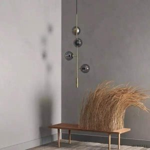 Lampa wisząca Orb w stylu industrialnym z kulistymi kloszami