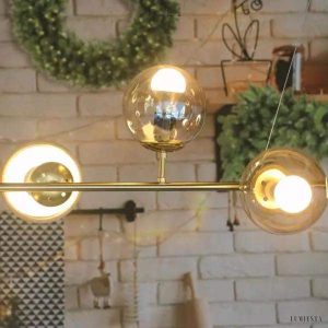 Lampa wisząca Orb w stylu industrialnym z kulistymi kloszami