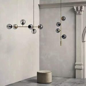 Lampa wisząca Orb w stylu industrialnym z kulistymi kloszami