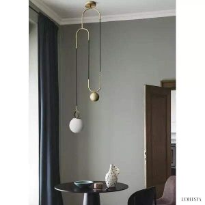 Nowoczesna lampa wisząca w kształcie koła mosiężna i szklana