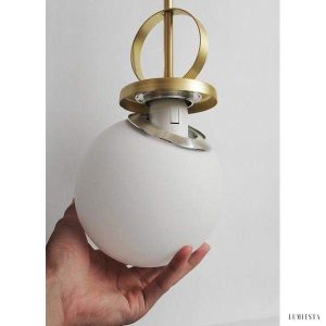 Nowoczesna lampa wisząca w kształcie koła mosiężna i szklana