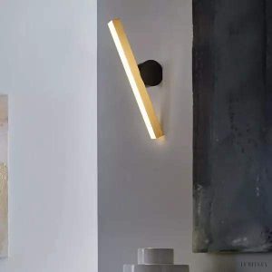 Lampa ścienna Calé geometria i elegancja z wbudowanym LED