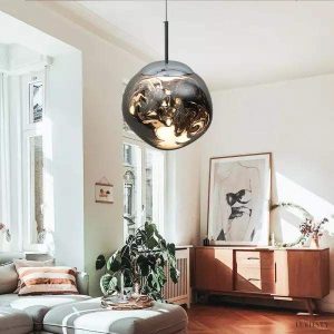 Lampa wisząca Eloru z efektowną szklaną kulą i metalowym zawieszeniem