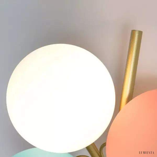 Kolorowa lampa ścienna w kształcie globu z liśćmi