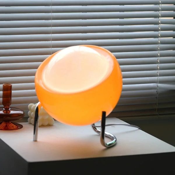 Colorful table lamp in a modern round shape