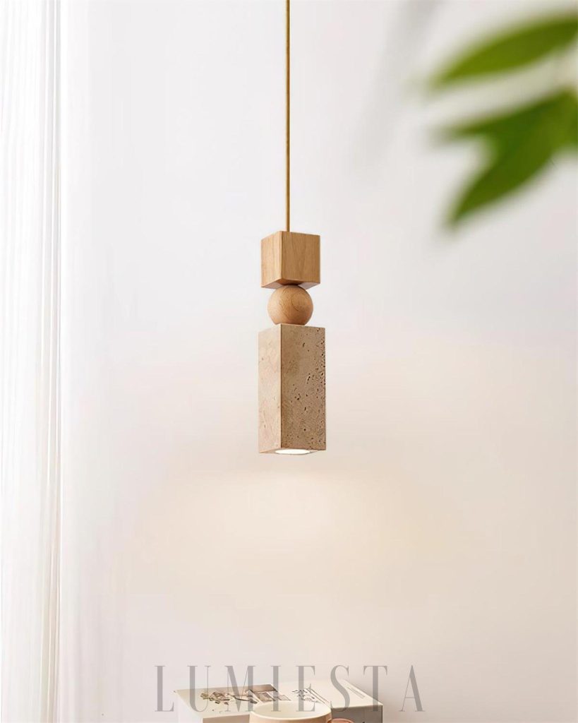 Cylindryczna lampa wisząca z trawertynu - ciepłe światło prześwitujące przez kamienny klosz
