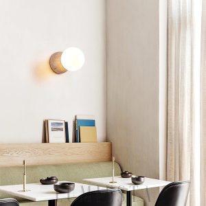 Nowoczesna lampa ścienna Tion z beżowym travertynem