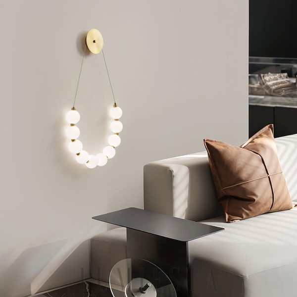 Necklace Loop - Elegancka lampa ścienna z mosiądzu
