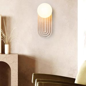 Owalny trawertynowy kinkiet Trent 11x16x25cm beżowy