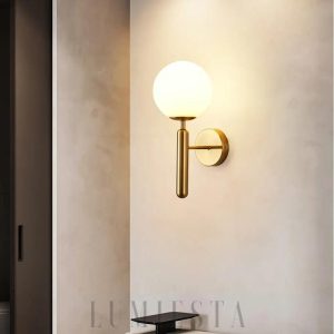 Lampa ścienna okrągła czarna lub złota w nowoczesnym stylu, widok pod kątem