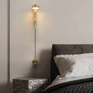 Nowoczesna złota lampa ścienna z regulacją