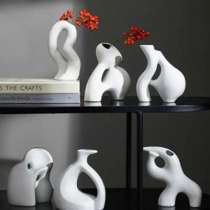 wm_7689017553085504600.jpg Elegancki biały ceramiczny wazon 12–14 cm