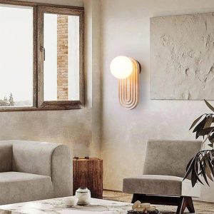 Owalny trawertynowy kinkiet Trent 11x16x25cm beżowy