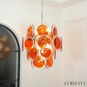 Argento - lampa wisząca z niklowanego metalu i pomarańczowego szkła, ujęcie skośne