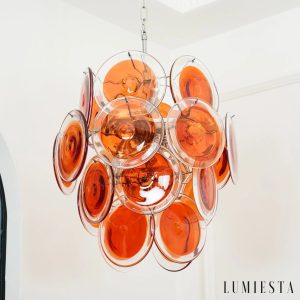 Argento - detal zawieszenia lampy wiszącej metalowej z pomarańczowym szkłem