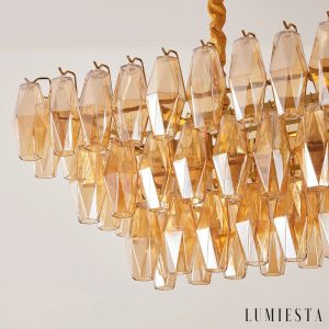 Lampa wisząca Cometa z metalową konstrukcją i bursztynowym szkłem, widok z boku
