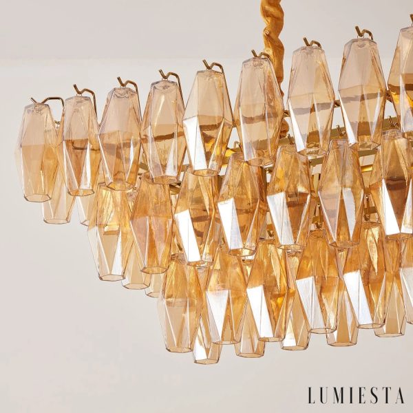 Lampa wisząca Cometa z metalową konstrukcją i bursztynowym szkłem, widok z boku