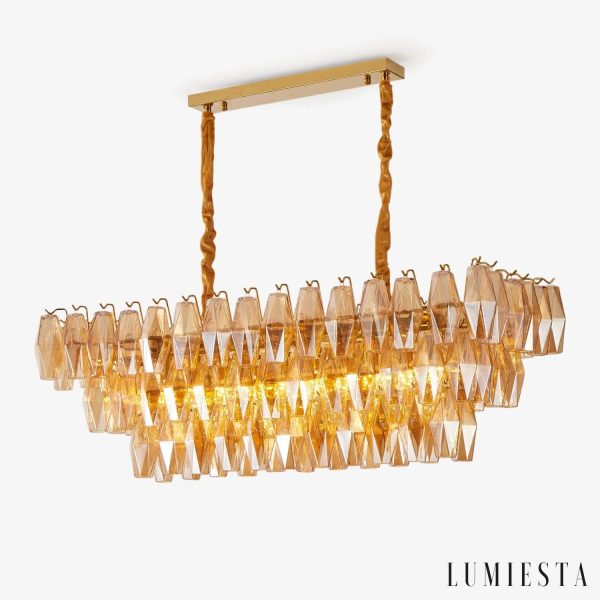 Lampa wisząca złota z bursztynowym szkłem Cometa nad stół, widok z przodu