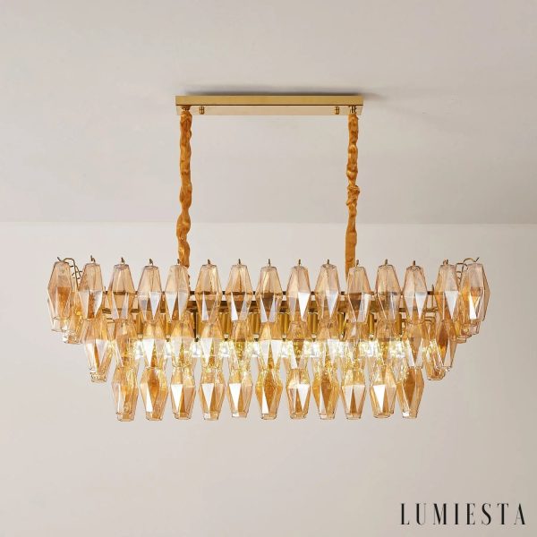 Złota lampa wisząca Cometa z bursztynowym szkłem, ujęcie z detalem zawieszenia