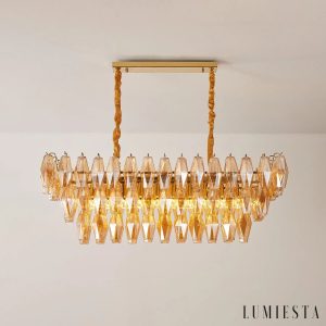 Cometa - całość lampy wiszącej z metalem i bursztynowym szkłem w eleganckiej formie