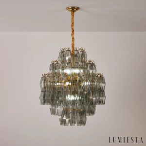 Prestigio - złota oprawa i dymne szkło w lampie wiszącej glamour
