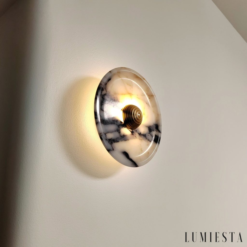 Gialio marble wall light with chrome - side view of its slim, round shape