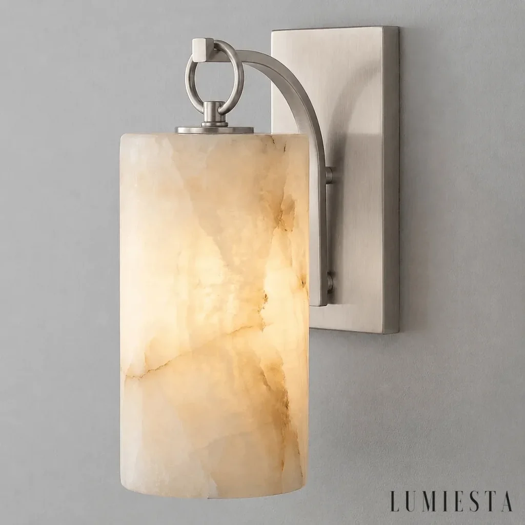 Javea - wall light with an alabaster cylinder on a ring - with the light switched on