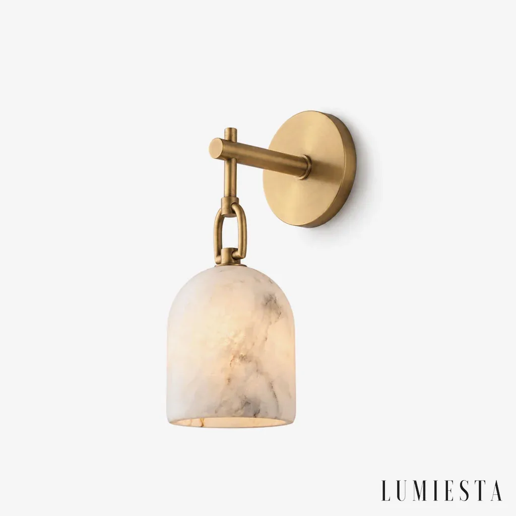 Piombino - alabaster wall light with a bell shade on a copper arm - front view